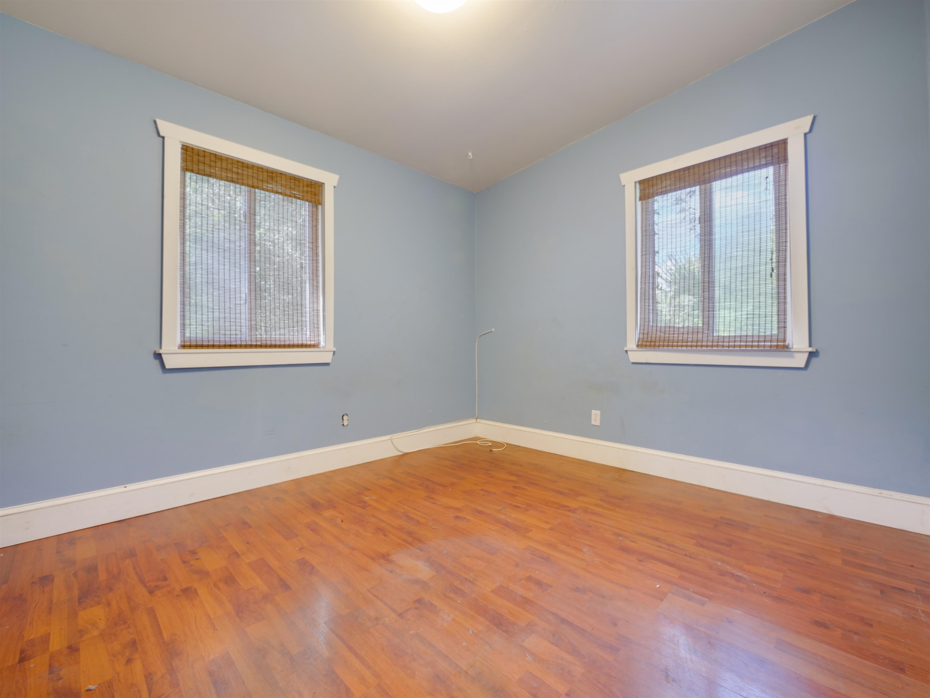 262 Spring Street St. Augustine, FL 32084 - Photo 17 of 25 a view of an empty room with wooden floor and a window