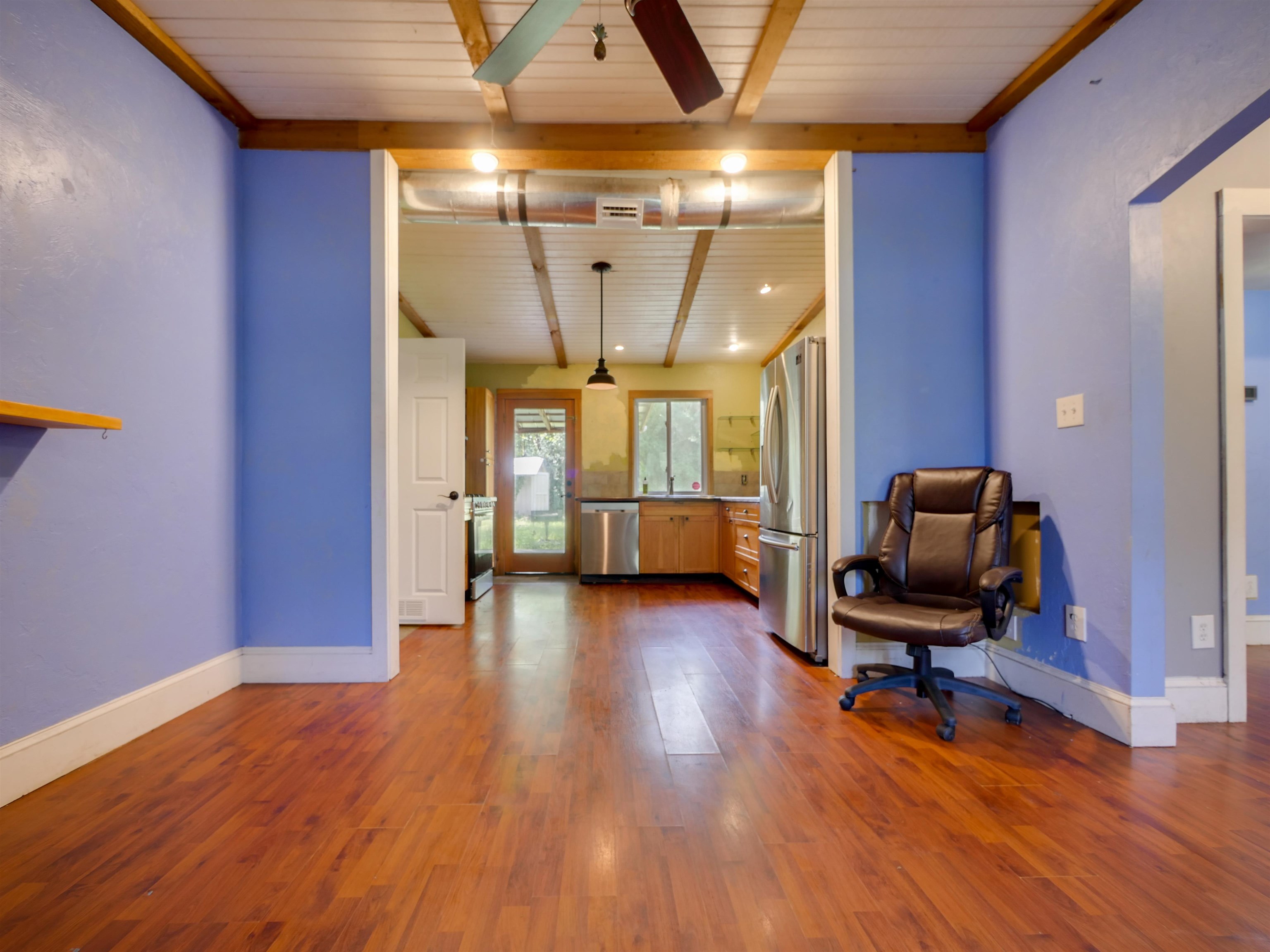 262 Spring Street St. Augustine, FL 32084 - Photo 4 of 25 a livingroom with workspace and a window