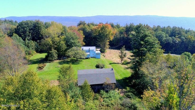 457 Horrigan Road Clarksburg, MA 01247 - Photo 2 of 32 an aerial view of a house with a garden