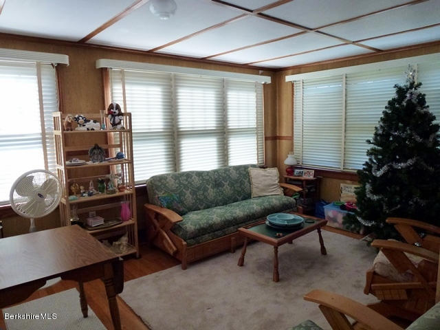 457 Horrigan Road Clarksburg, MA 01247 - Photo 13 of 32 a living room with furniture and a window