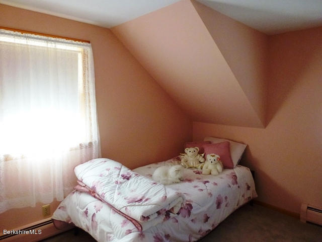 457 Horrigan Road Clarksburg, MA 01247 - Photo 18 of 32 a bedroom with a bed and a window
