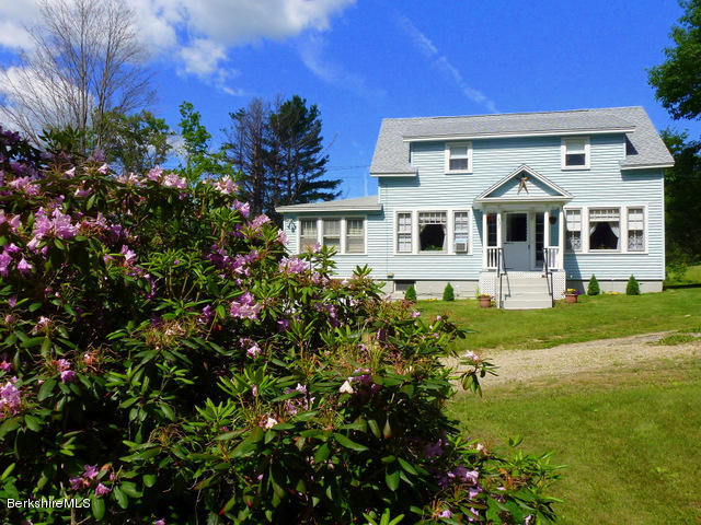 457 Horrigan Road Clarksburg, MA 01247 - Photo 3 of 32 a front view of a house with a yard
