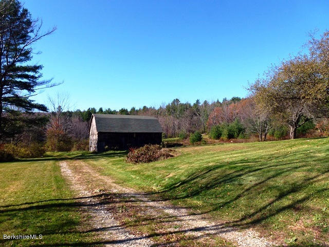 457 Horrigan Road Clarksburg, MA 01247 - Photo 26 of 32 a view of a backyard with large trees