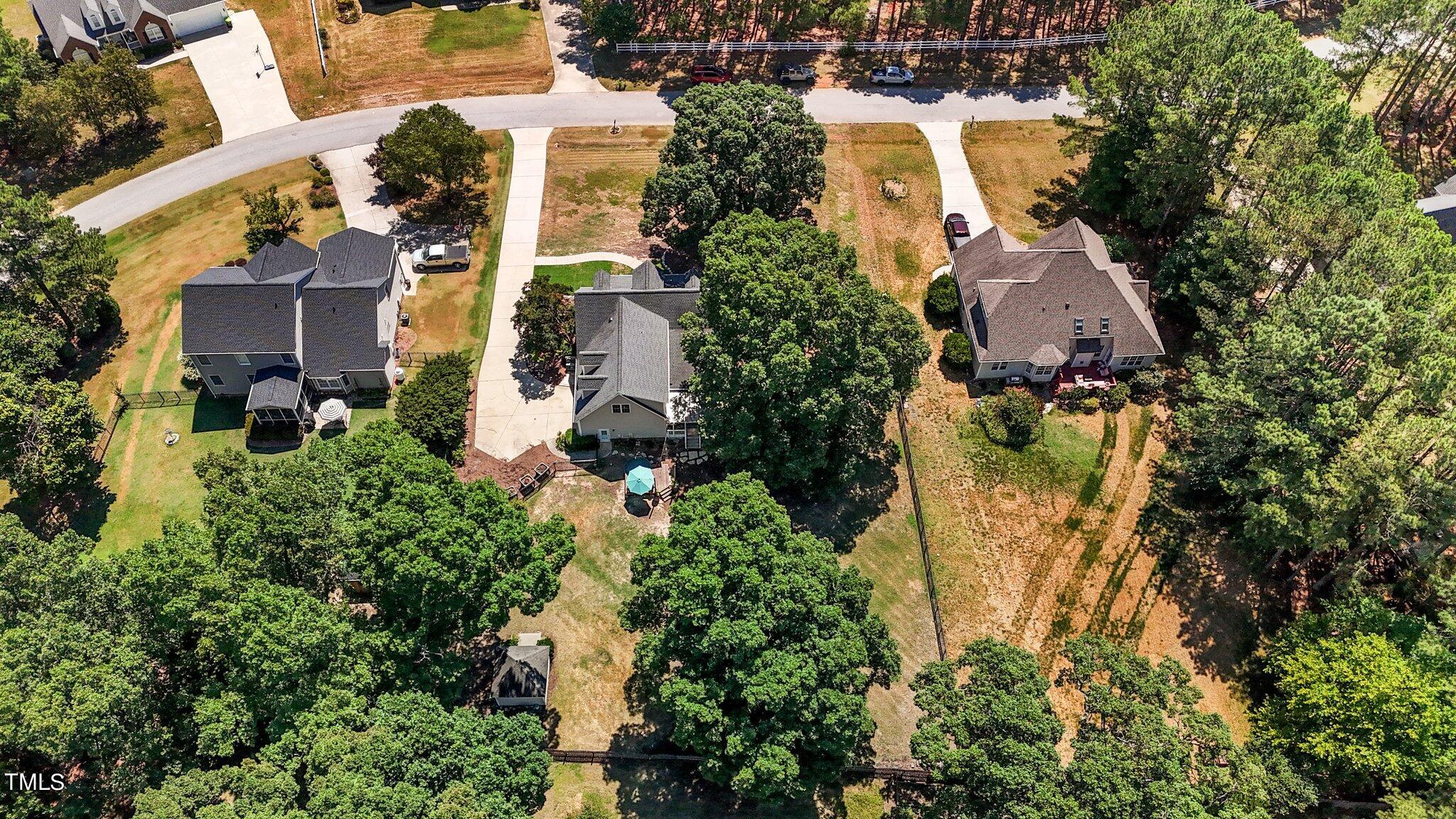 1917 Wheelerbrook Court Raleigh, NC 27603 - Photo 11 of 49 14-web-or-mls-DJI_20240702112911_0517_D