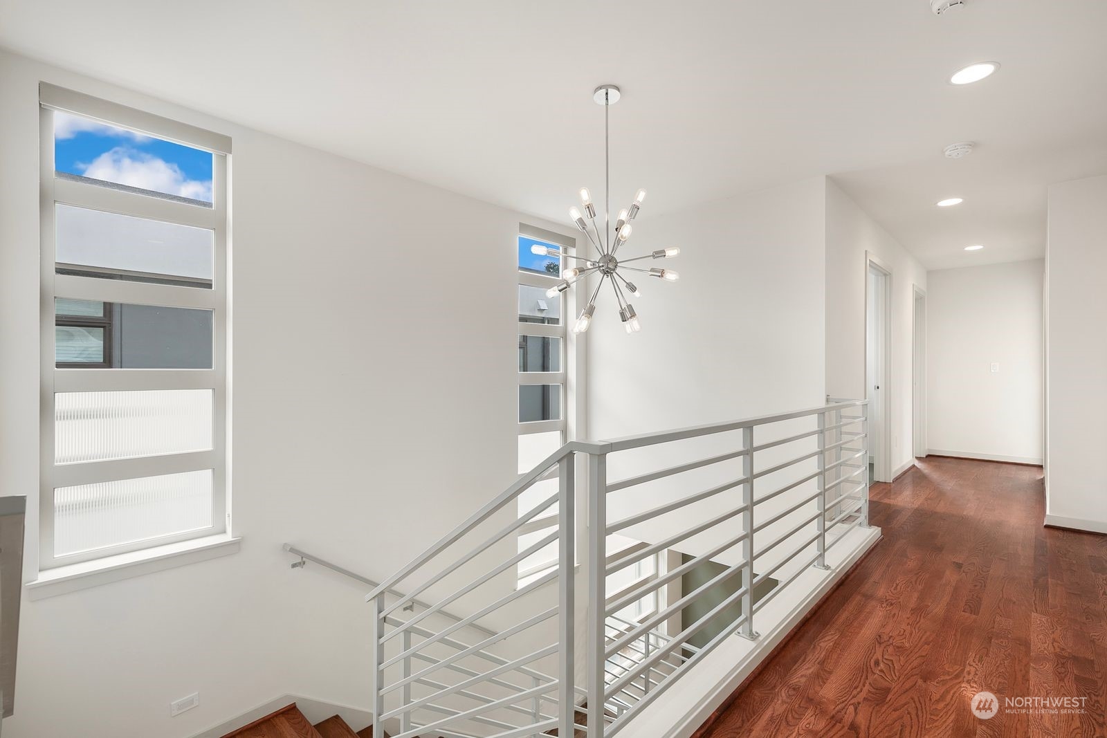2832 Northwest 65th Street Seattle, WA 98117 - Photo 15 of 38 a view of a hallway with wooden floor and entryway
