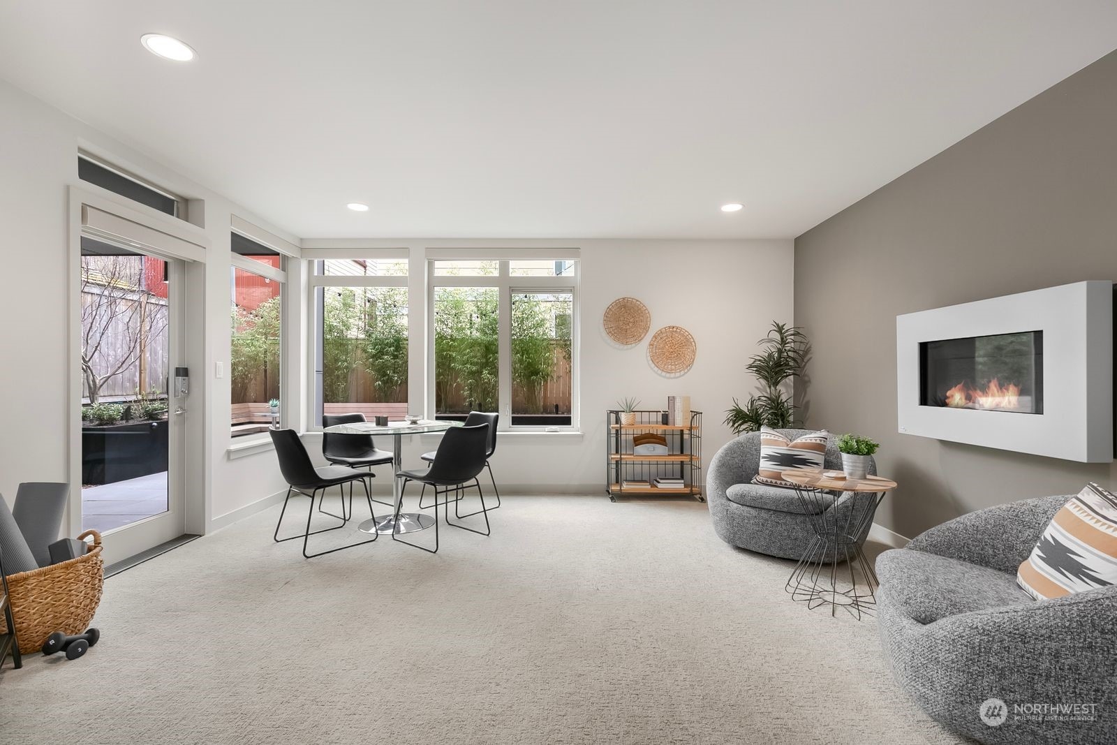 2832 Northwest 65th Street Seattle, WA 98117 - Photo 26 of 38 a living room with furniture and large windows