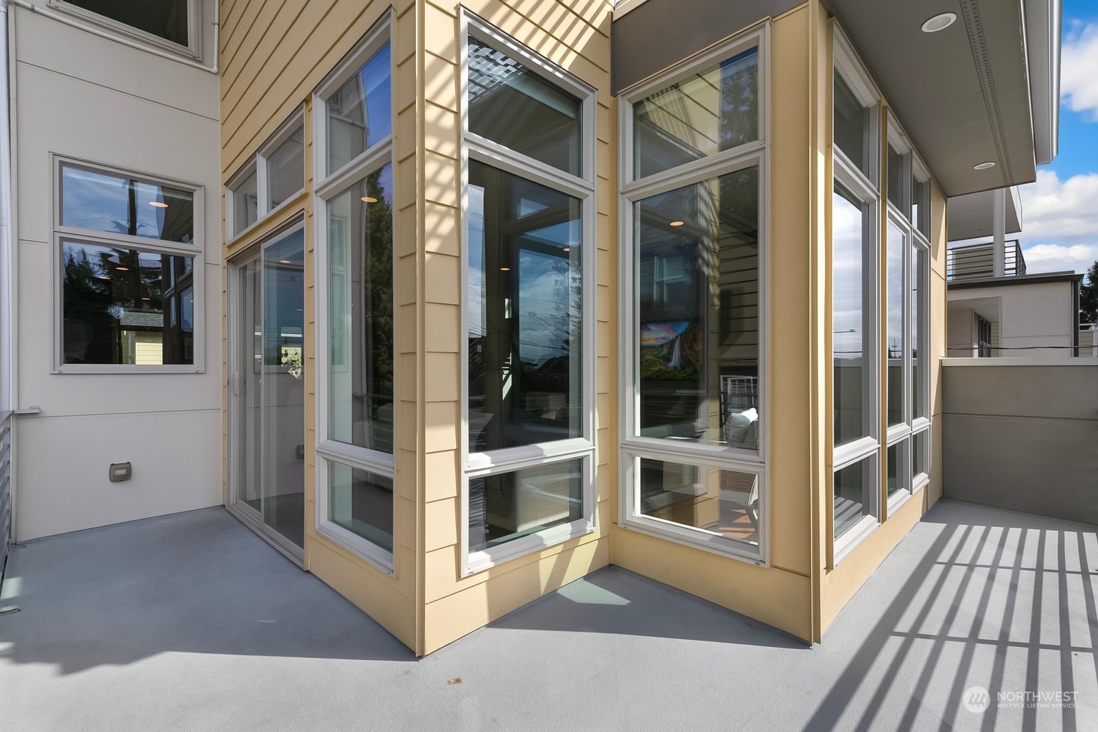 2832 Northwest 65th Street Seattle, WA 98117 - Photo 33 of 38 a view of a house with a glass door