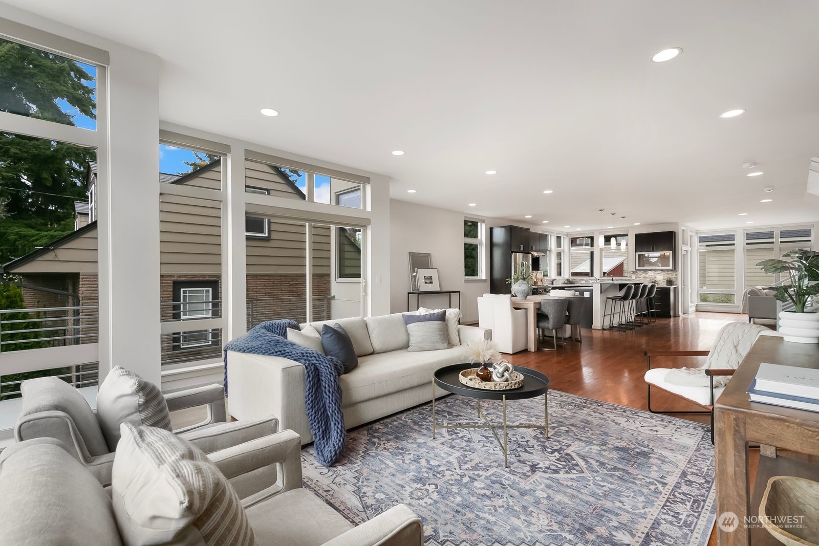 2832 Northwest 65th Street Seattle, WA 98117 - Photo 5 of 38 a living room with furniture and a large window