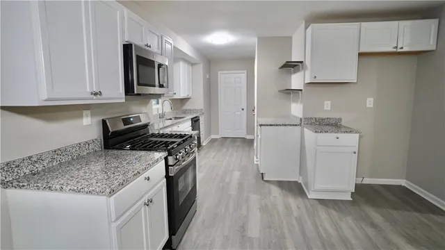 $360,000 | 5521 East Wind Drive Southwest, Lilburn, GA 30047