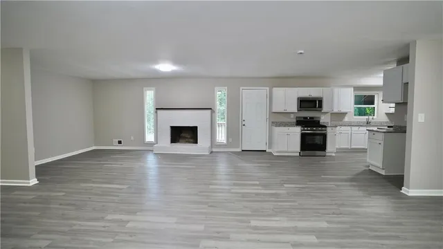 $360,000 | 5521 East Wind Drive Southwest, Lilburn, GA 30047