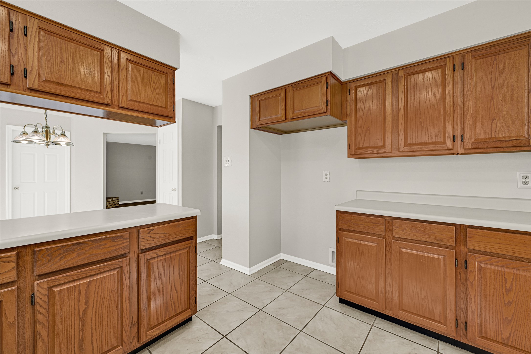 10210 Crooks Way Court Houston, TX 77065 - Photo 20 of 50 a kitchen with granite countertop cabinets stainless steel appliances and sink