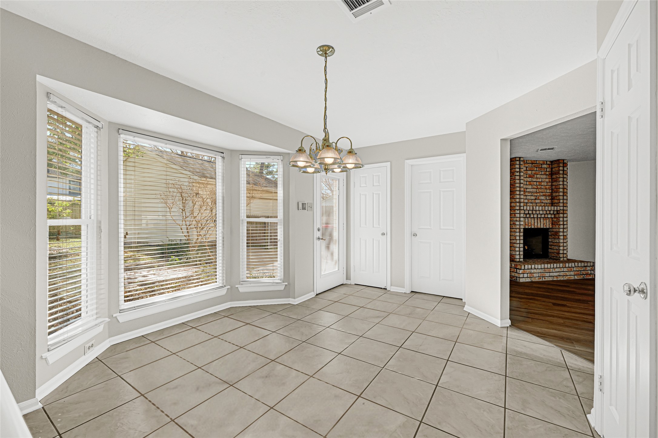 10210 Crooks Way Court Houston, TX 77065 - Photo 22 of 50 a view of an empty room with glass door