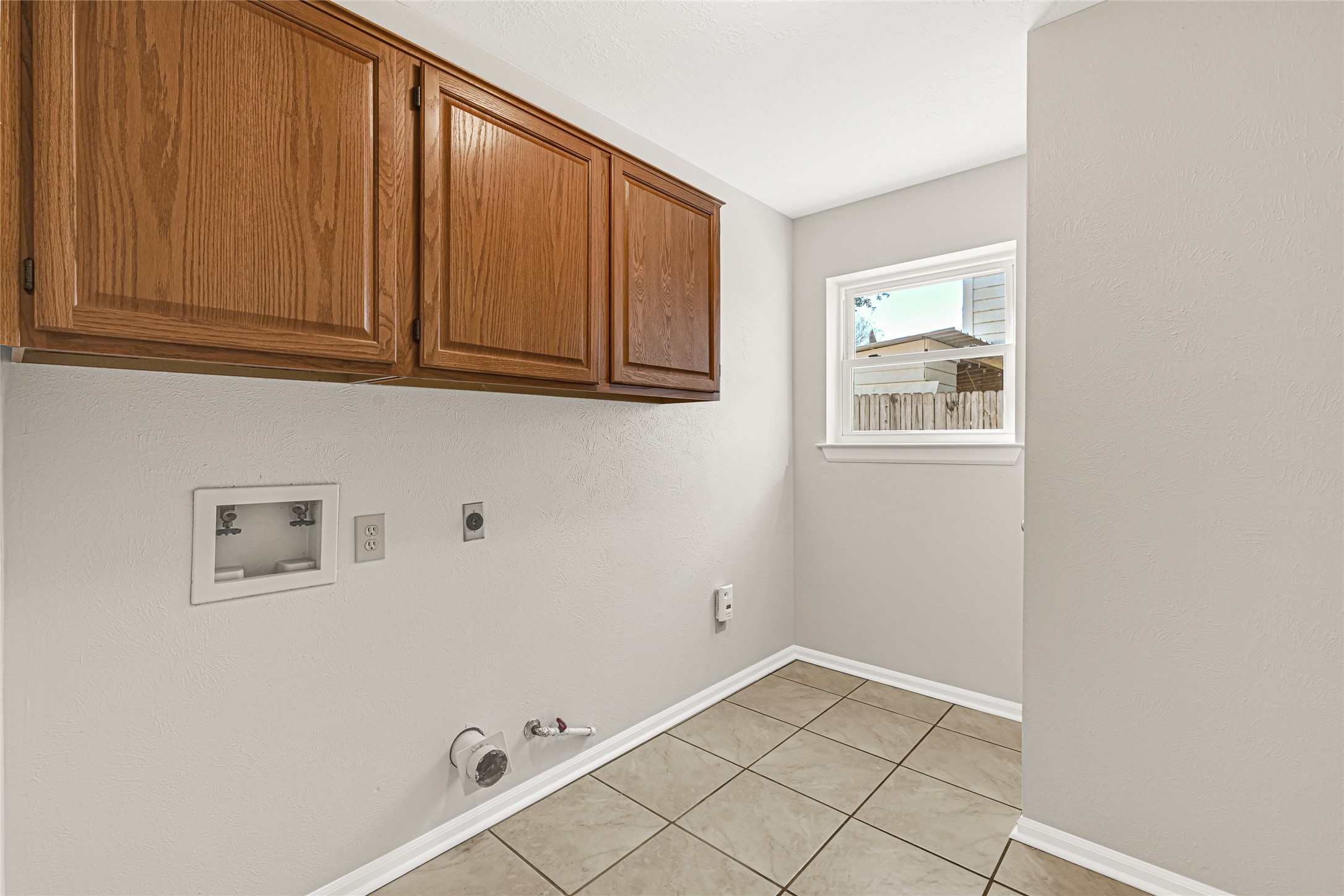 10210 Crooks Way Court Houston, TX 77065 - Photo 24 of 50 a view of an empty room and window