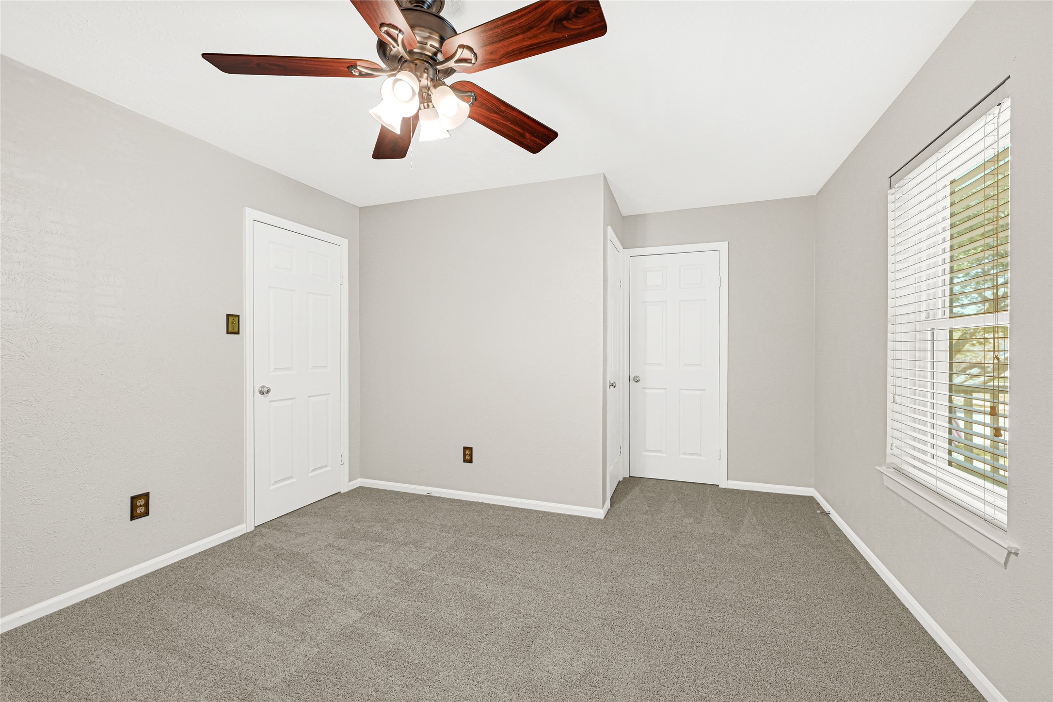 10210 Crooks Way Court Houston, TX 77065 - Photo 29 of 50 a view of an empty room with a window