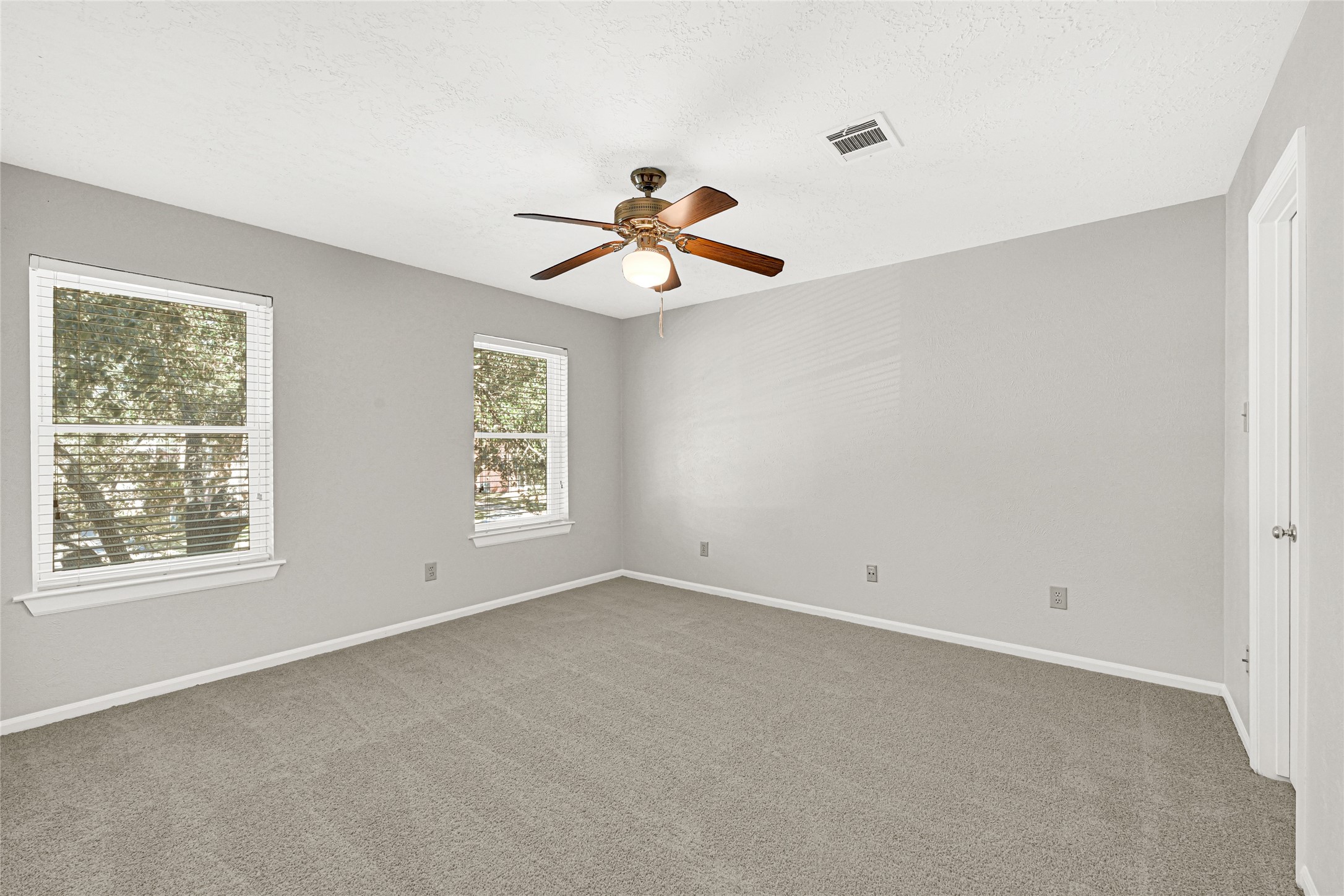 10210 Crooks Way Court Houston, TX 77065 - Photo 31 of 50 a view of an empty room with a window