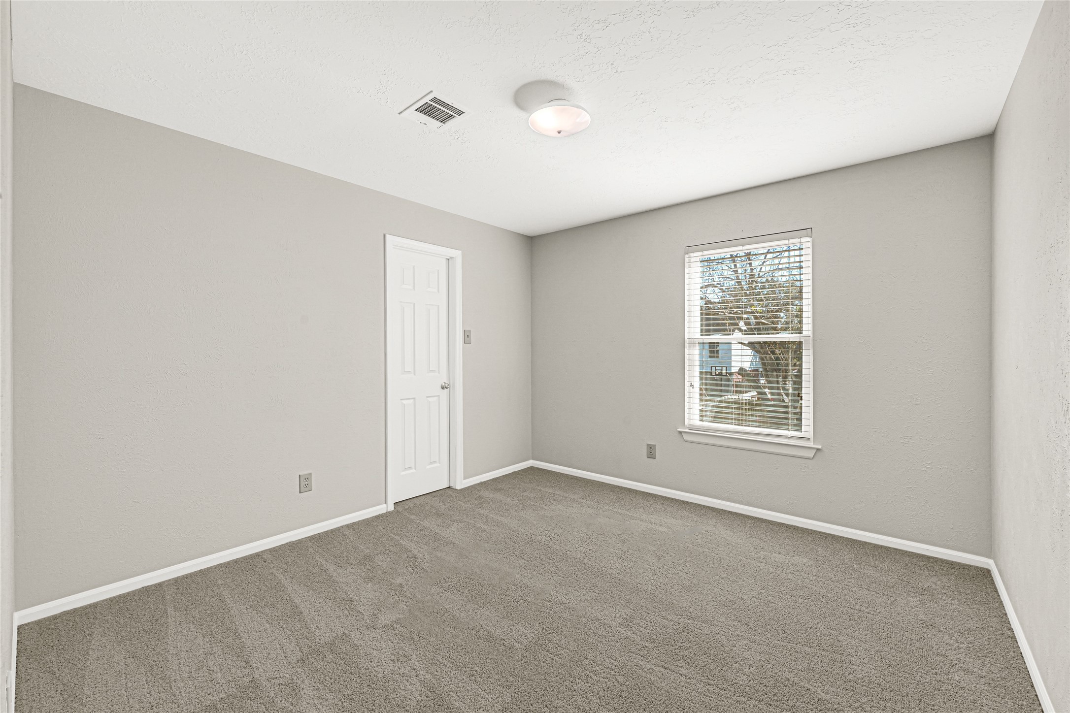10210 Crooks Way Court Houston, TX 77065 - Photo 33 of 50 an empty room with windows