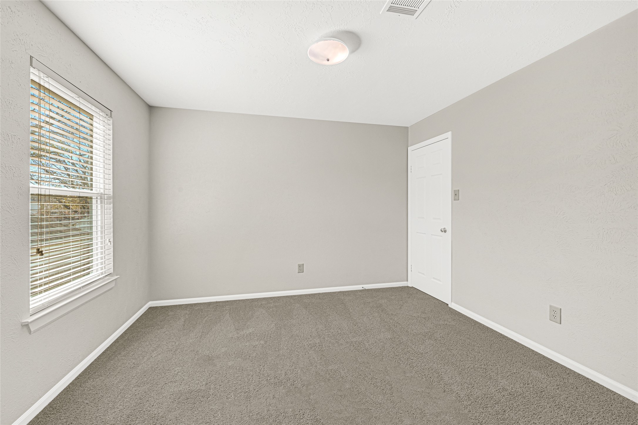 10210 Crooks Way Court Houston, TX 77065 - Photo 34 of 50 an empty room with a window