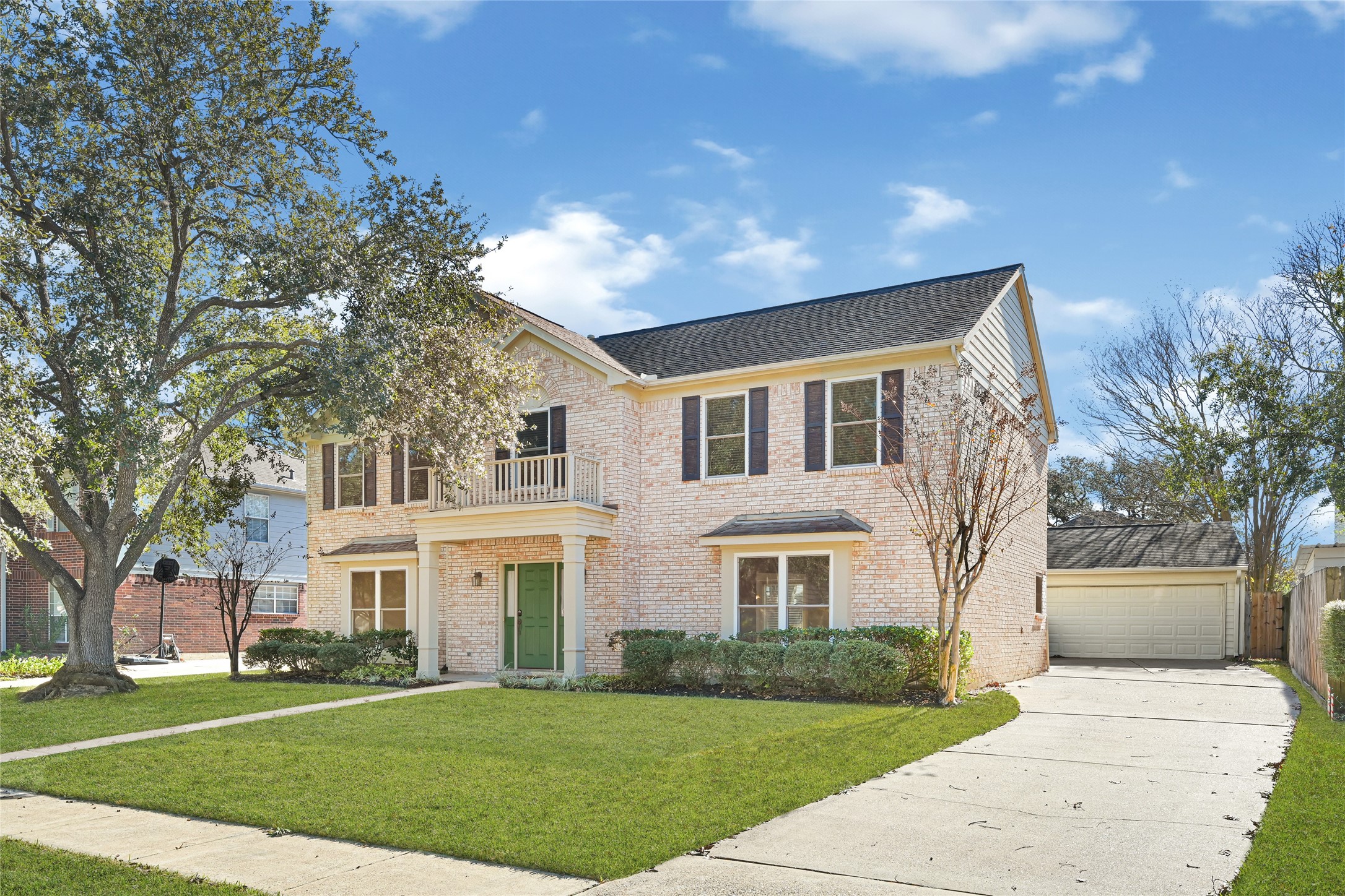 10210 Crooks Way Court Houston, TX 77065 - Photo 46 of 50 a front view of a house with a garden