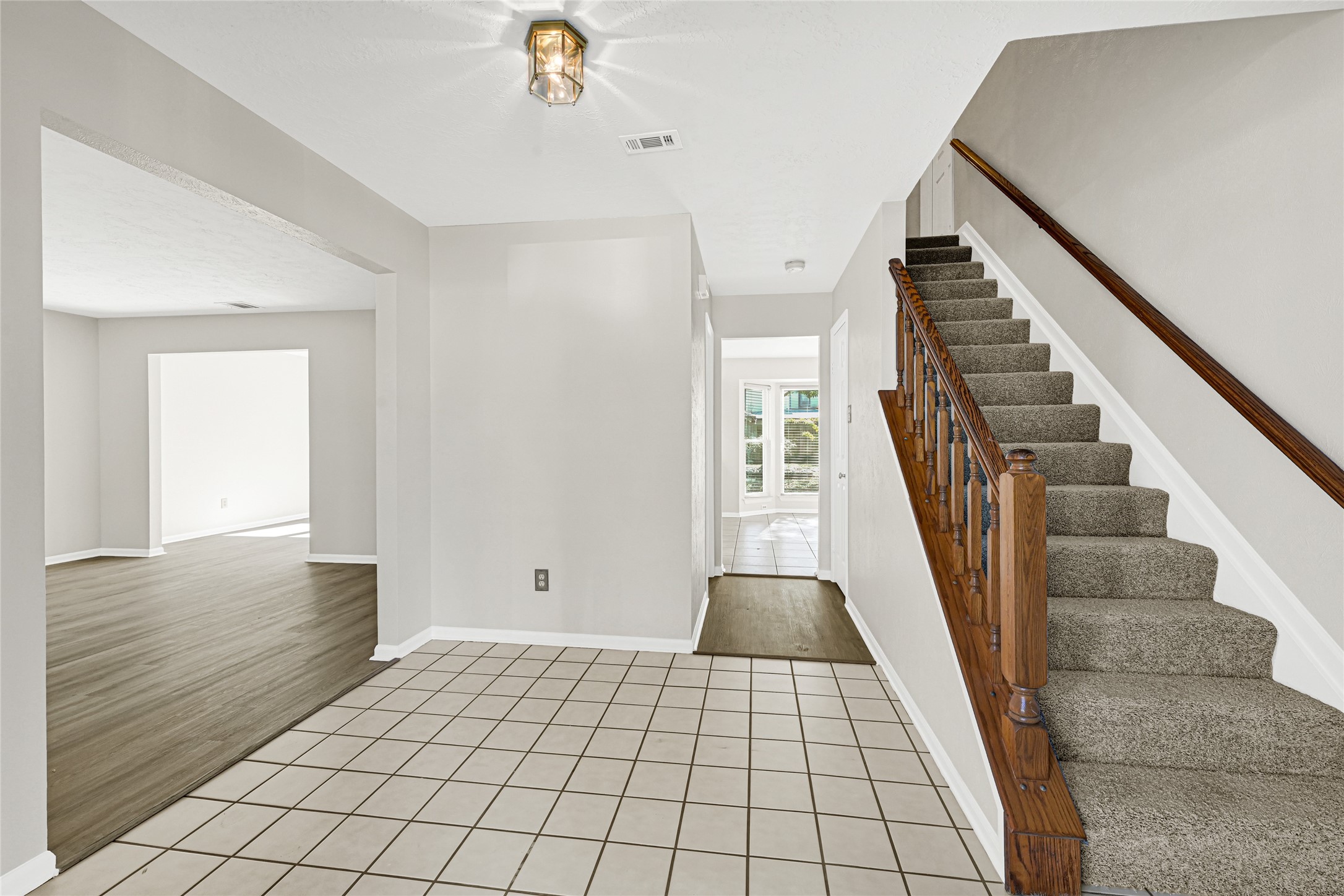 10210 Crooks Way Court Houston, TX 77065 - Photo 9 of 50 a view of an entryway with staircase