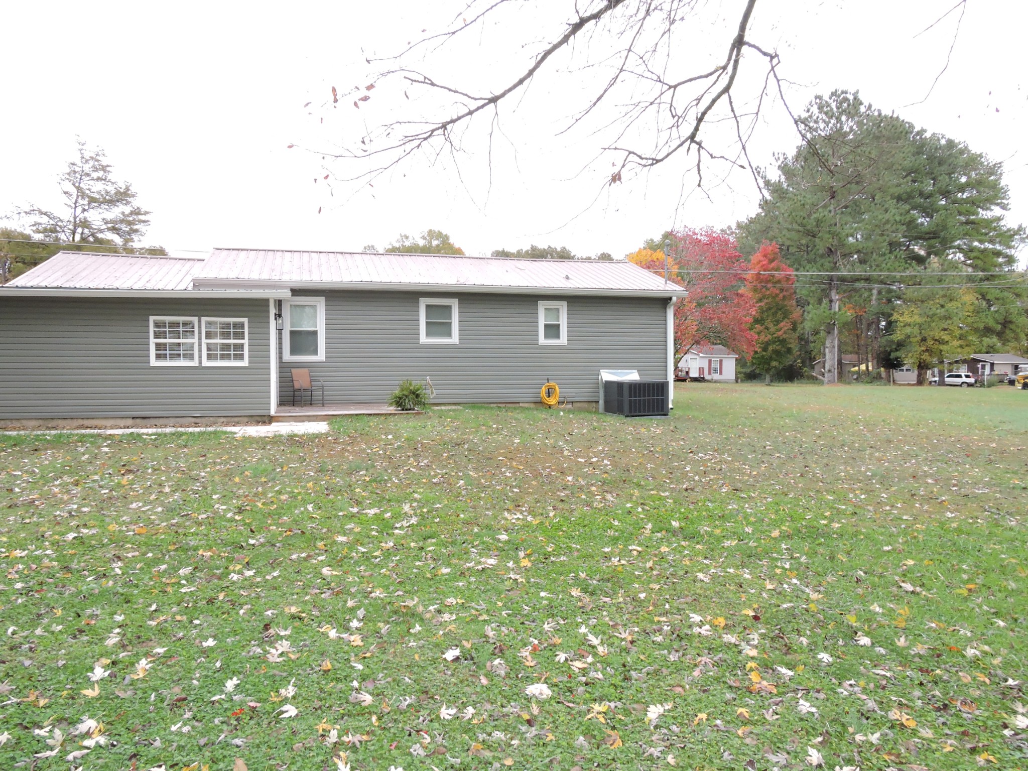 631 Riley Creek Road Tullahoma, TN 37388 - Photo 24 of 27 a view of a house with a yard