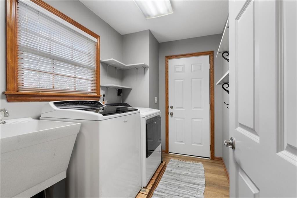 Undisclosed Address Gibsonia, PA 15044 - Photo 15 of 35 a utility room with cabinets washer and dryer