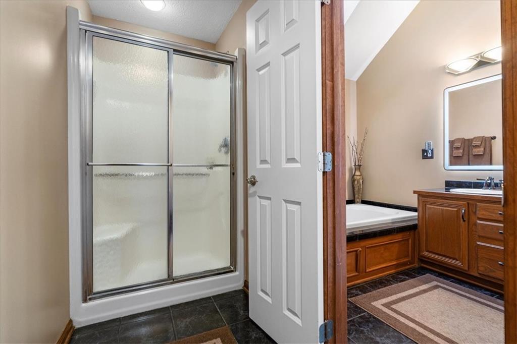 Undisclosed Address Gibsonia, PA 15044 - Photo 19 of 35 a room with wooden floor and white doors