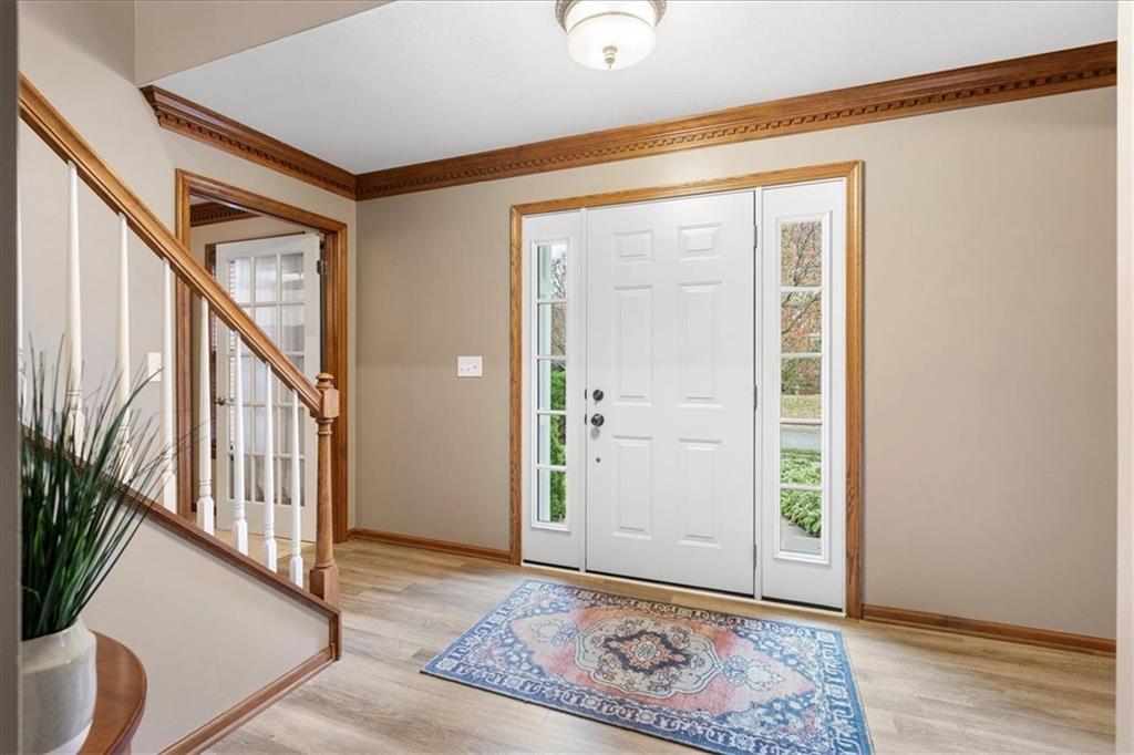Undisclosed Address Gibsonia, PA 15044 - Photo 2 of 35 a view of an entryway with wooden floor