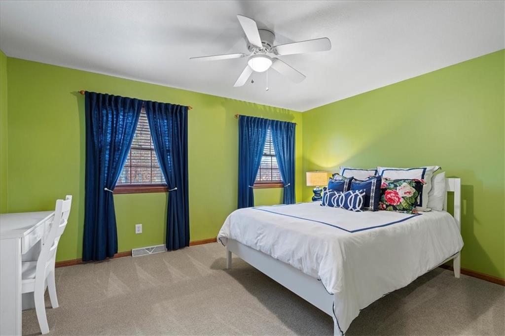 Undisclosed Address Gibsonia, PA 15044 - Photo 22 of 35 a bedroom with a bed and a window