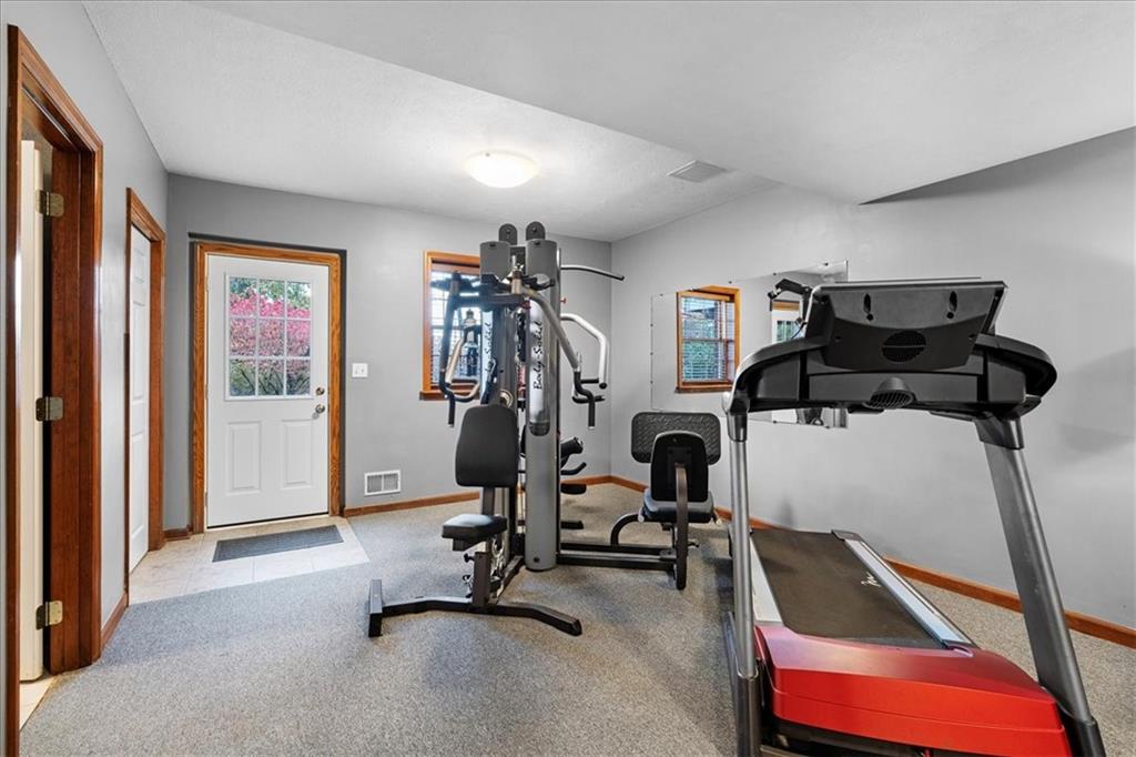 Undisclosed Address Gibsonia, PA 15044 - Photo 27 of 35 a view of a room with gym equipment