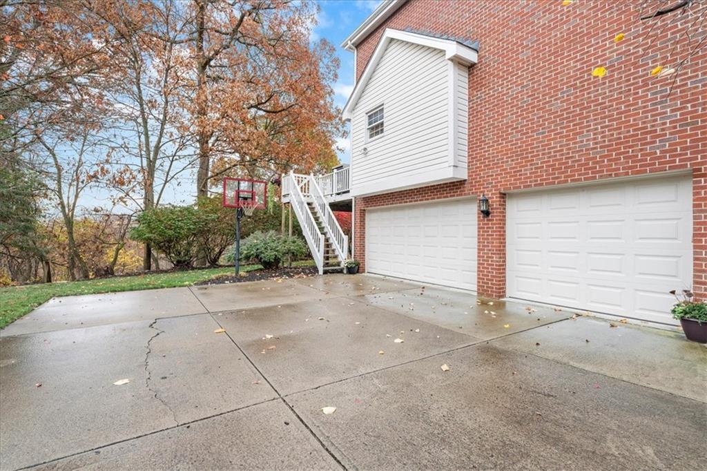 Undisclosed Address Gibsonia, PA 15044 - Photo 29 of 35 a backyard of a house with plants and trees