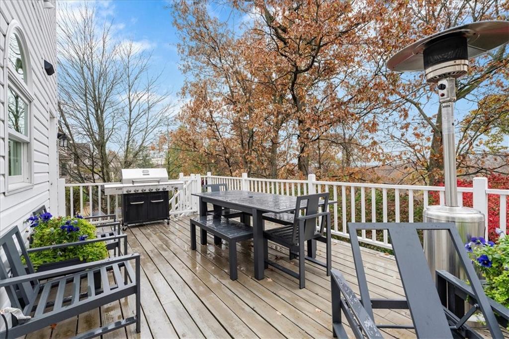Undisclosed Address Gibsonia, PA 15044 - Photo 31 of 35 a view of a chairs and table on the wooden deck