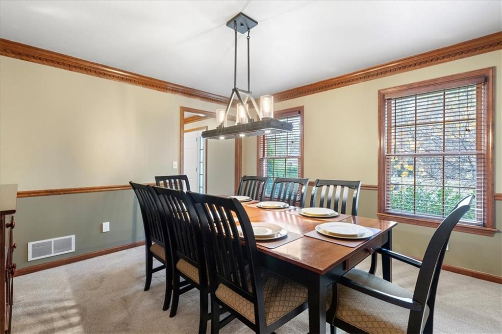 Undisclosed Address Gibsonia, PA 15044 - Photo 7 of 35 a view of a dining room with furniture window and outside view