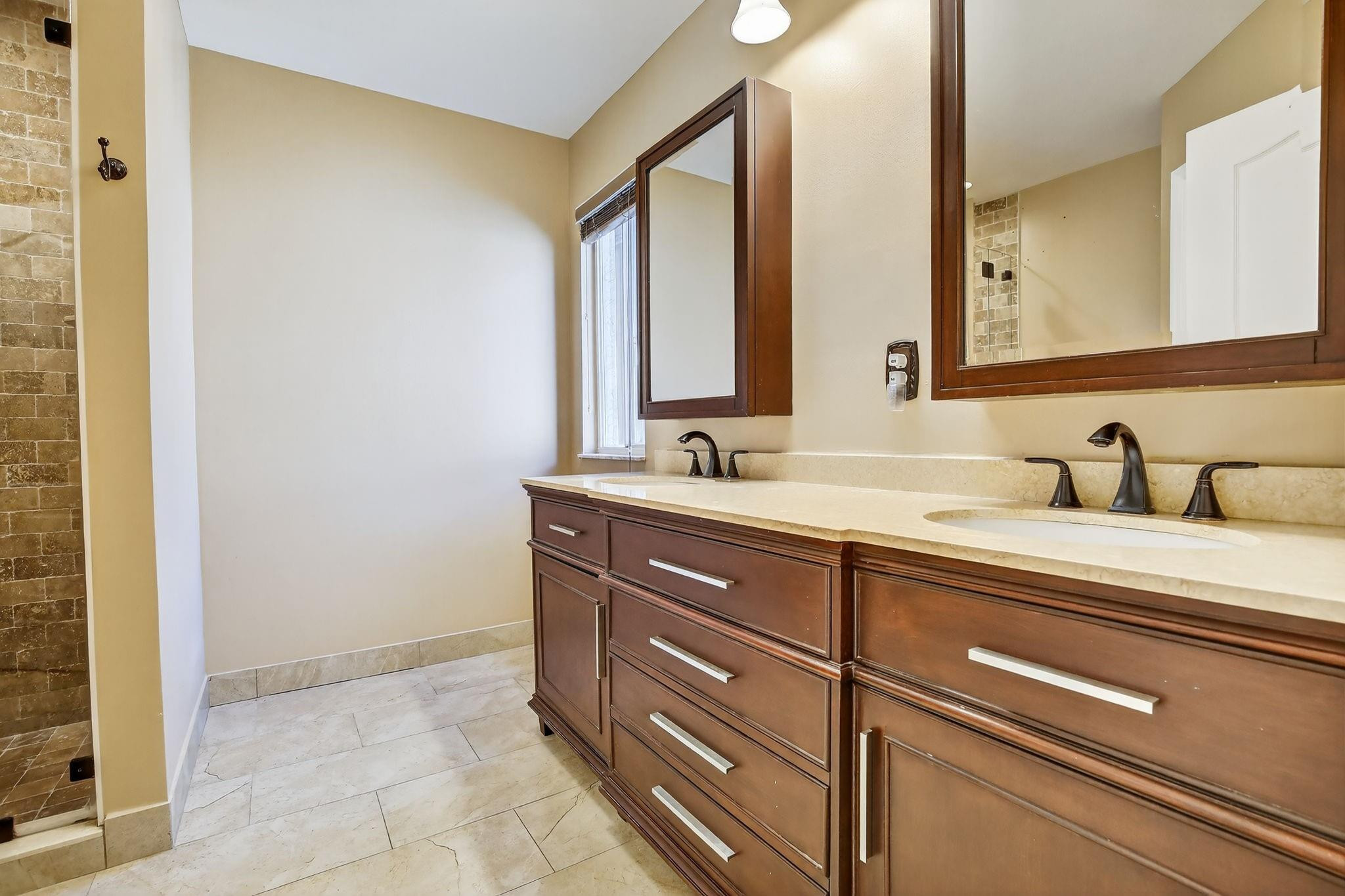 19427 Southwest 65th Street Fort Lauderdale, FL 33332 - Photo 23 of 56 a bathroom with a sink and a mirror