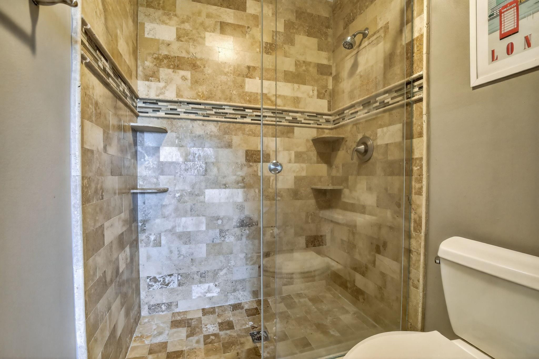 19427 Southwest 65th Street Fort Lauderdale, FL 33332 - Photo 36 of 56 a bathroom with a shower and a toilet