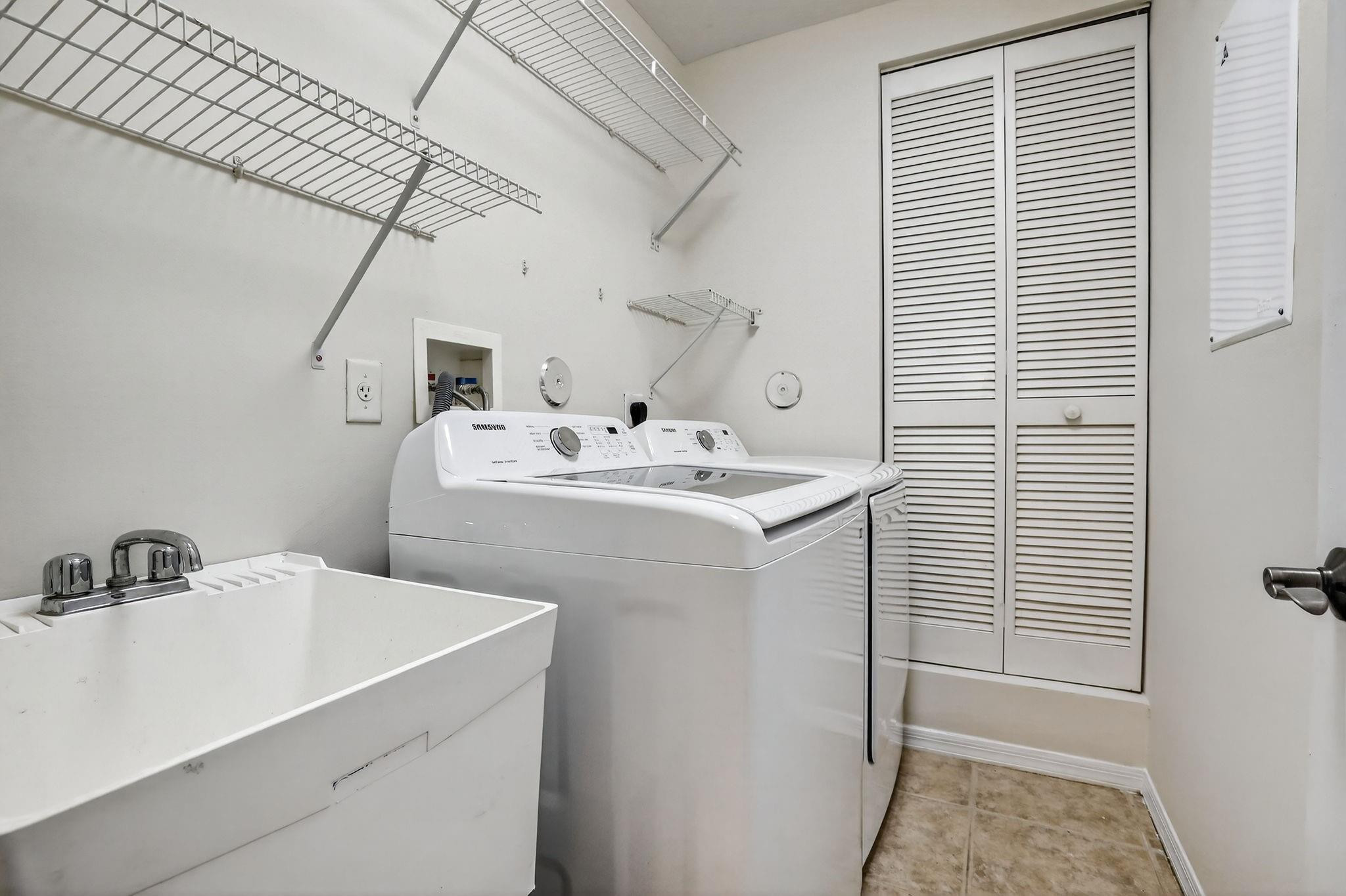19427 Southwest 65th Street Fort Lauderdale, FL 33332 - Photo 40 of 56 a utility room with dryer and washer