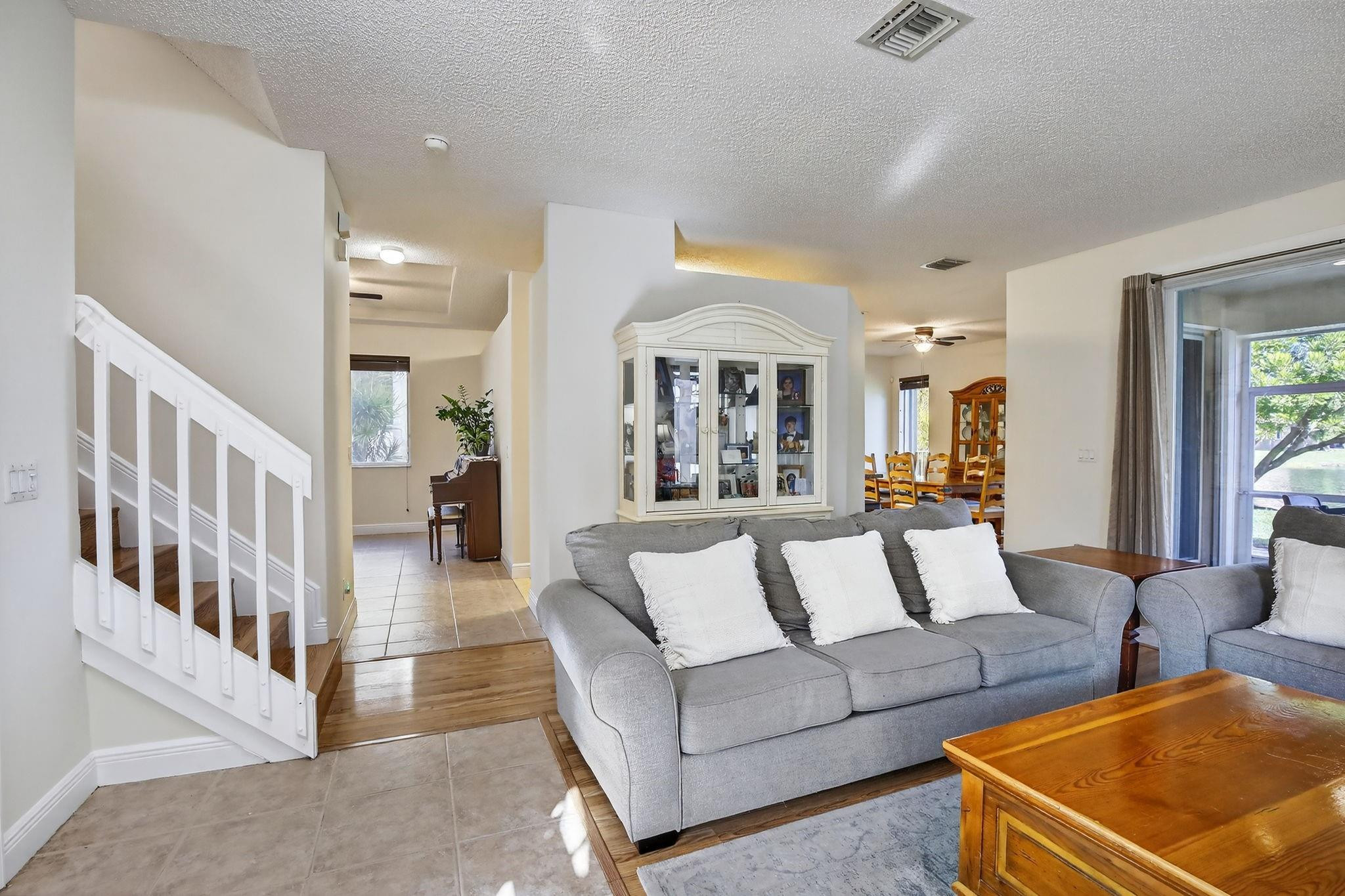 19427 Southwest 65th Street Fort Lauderdale, FL 33332 - Photo 4 of 56 a living room with furniture and a table