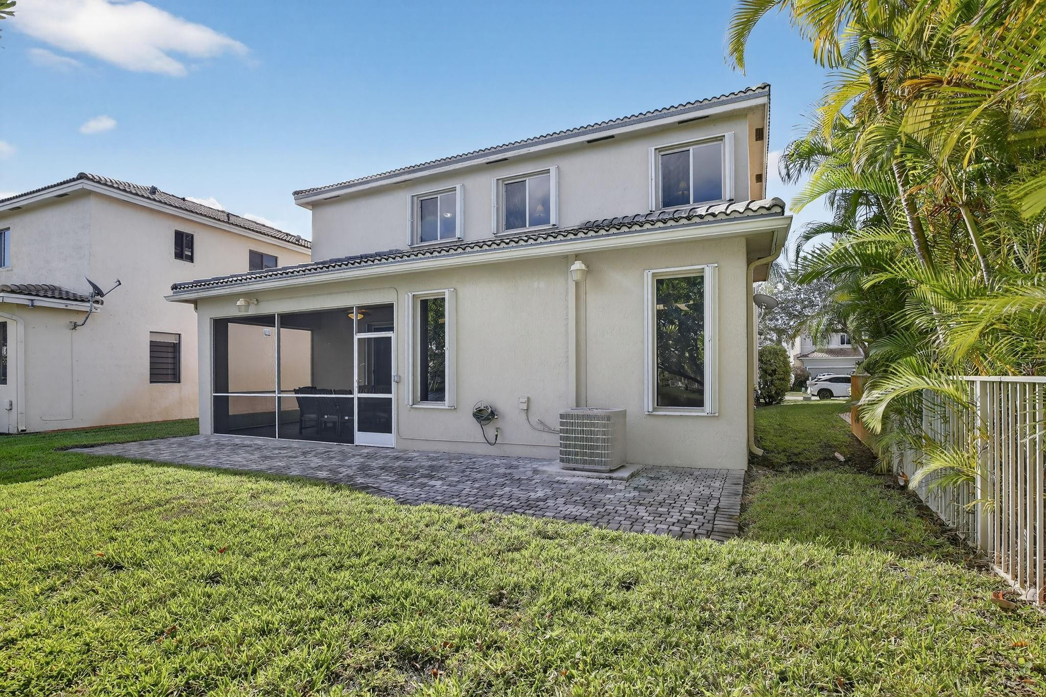 19427 Southwest 65th Street Fort Lauderdale, FL 33332 - Photo 44 of 56 a front view of a house with garden