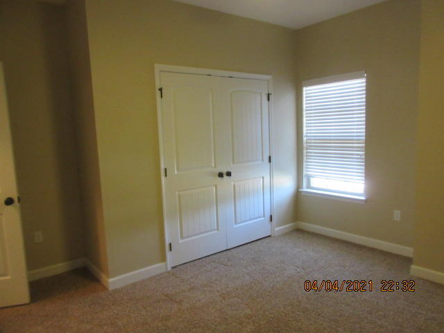 4434 Mirada Way Crestview, FL 32539 - Photo 14 of 21 an empty room with windows