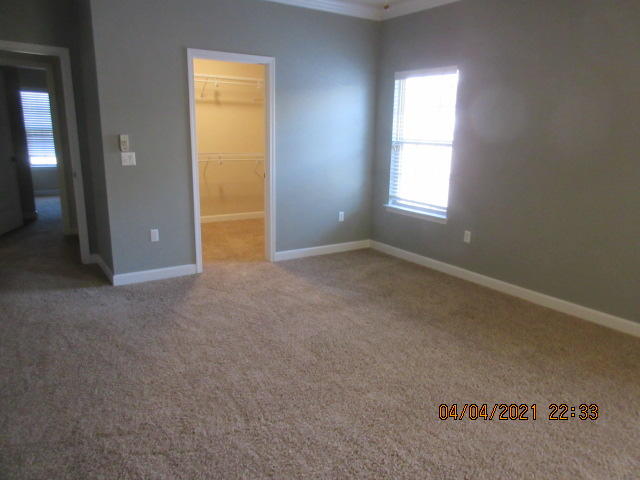 4434 Mirada Way Crestview, FL 32539 - Photo 15 of 21 an empty room with windows and closet