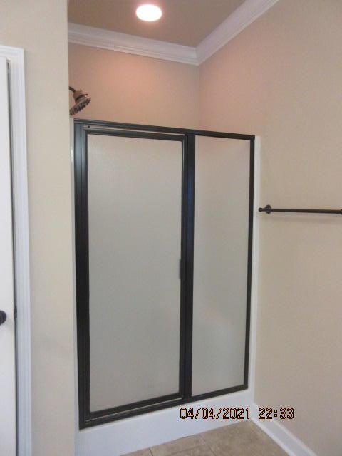 4434 Mirada Way Crestview, FL 32539 - Photo 18 of 21 a bathroom with a shower and a mirror