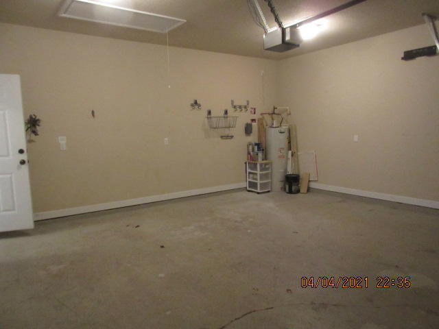 4434 Mirada Way Crestview, FL 32539 - Photo 19 of 21 an empty room with chandelier fan