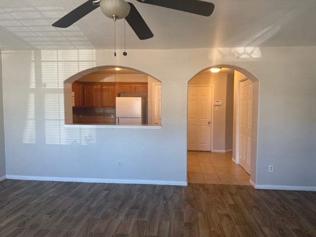 5419 Quail Cove Lane Houston, TX 77053 - Photo 3 of 13 an empty room with wooden floor and windows