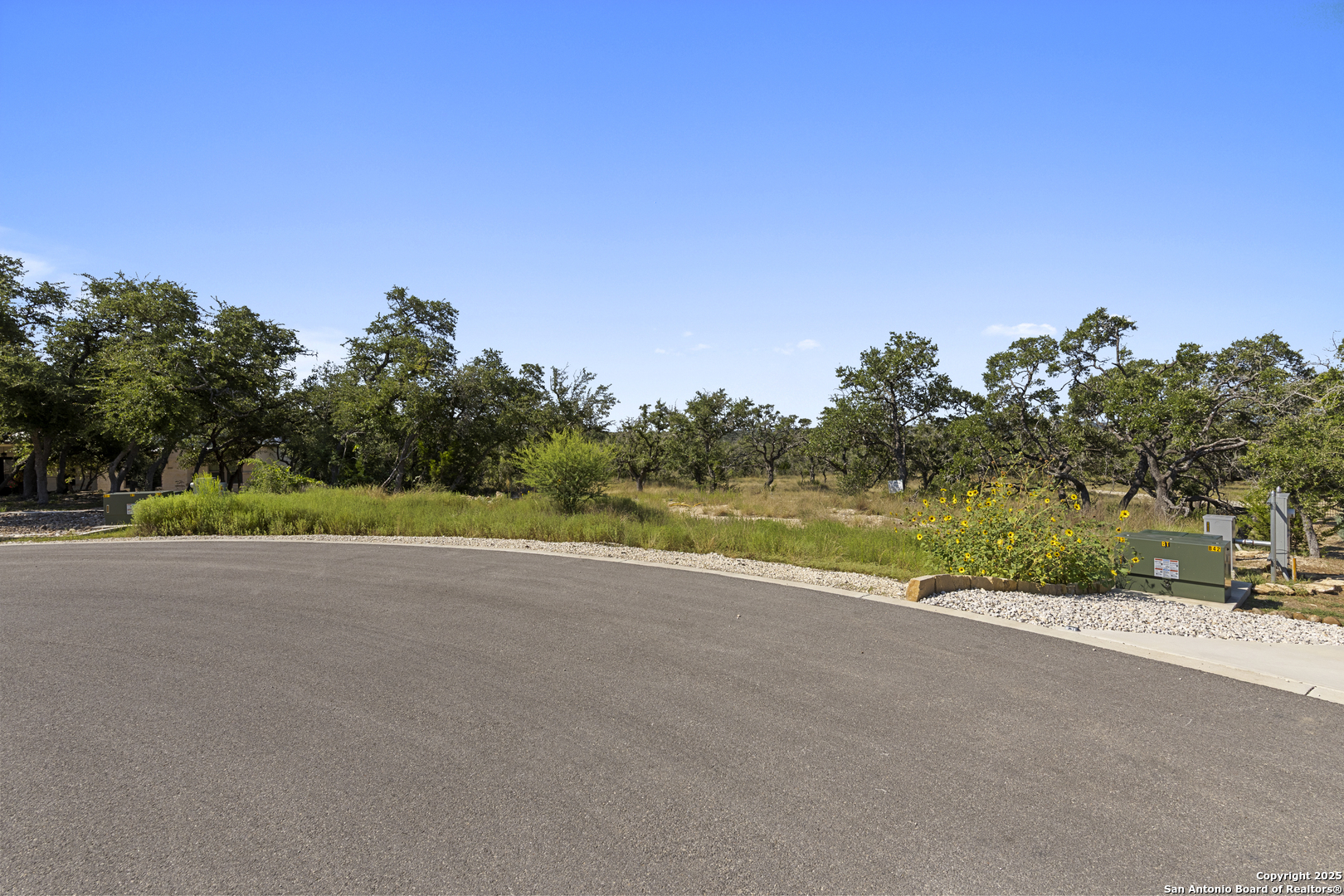749 Johanna Rdg Road Bulverde, TX 78163 - Photo 19 of 26 a view of a road with a building in the background
