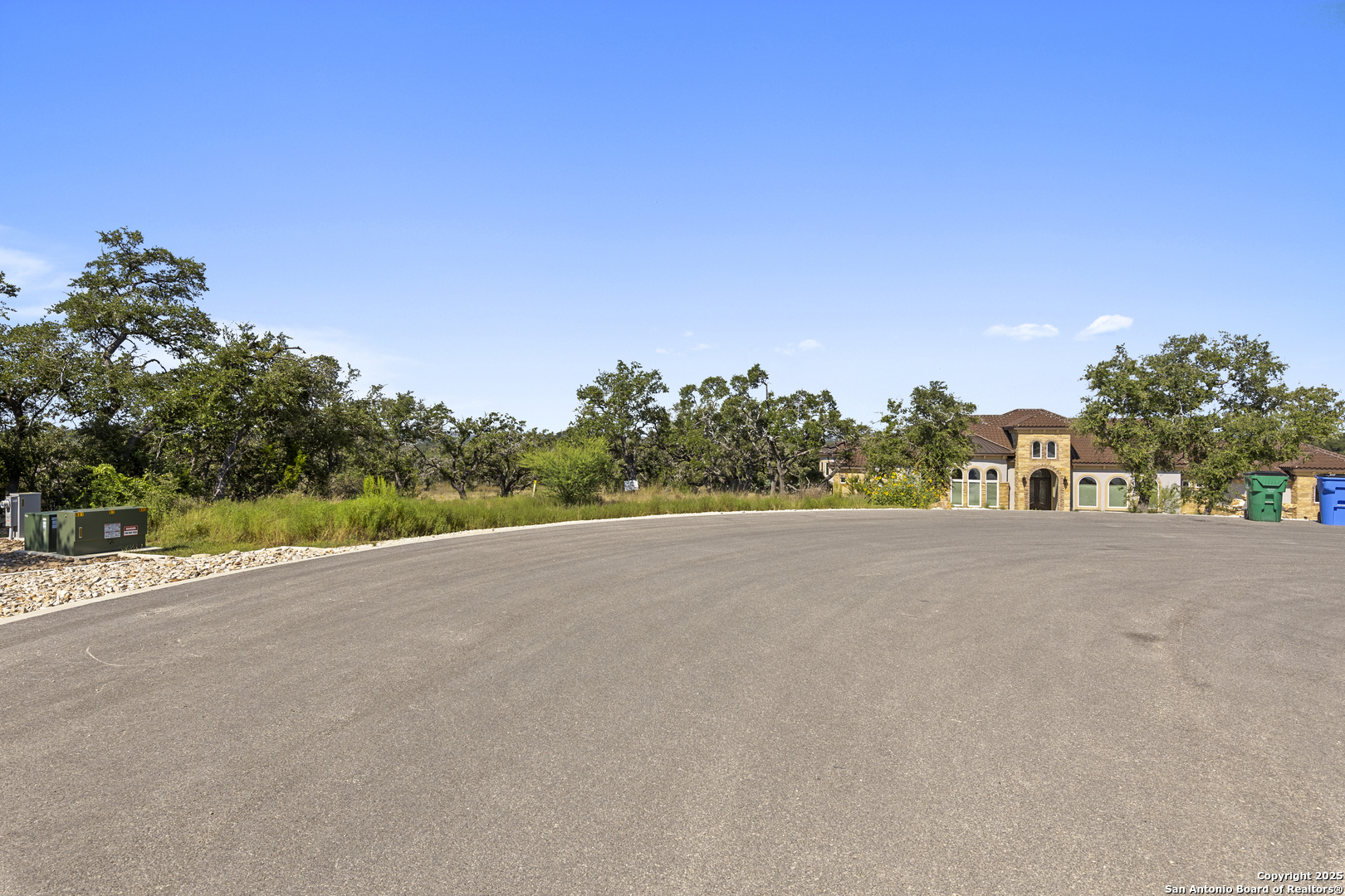 749 Johanna Rdg Road Bulverde, TX 78163 - Photo 25 of 26 a view of a road with a building in the background