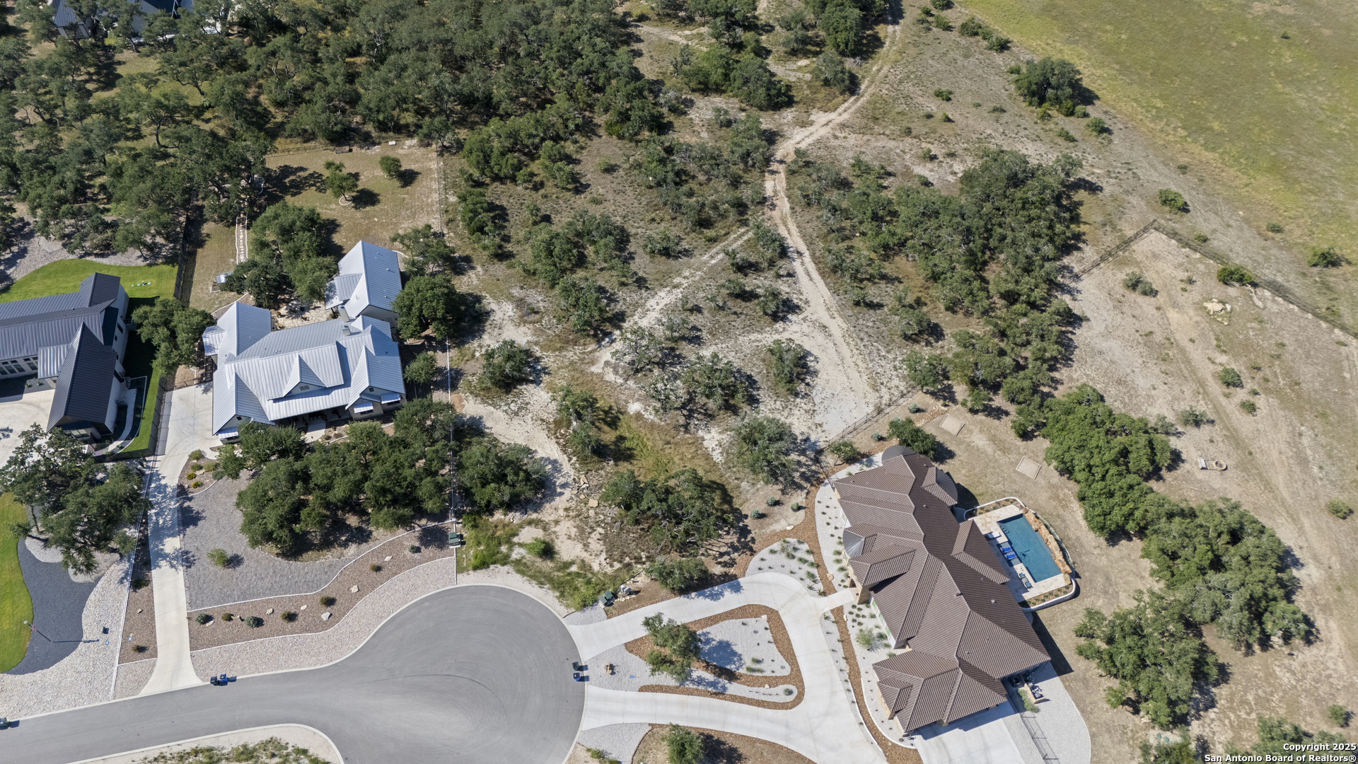749 Johanna Rdg Road Bulverde, TX 78163 - Photo 3 of 26 an aerial view of a house with a yard