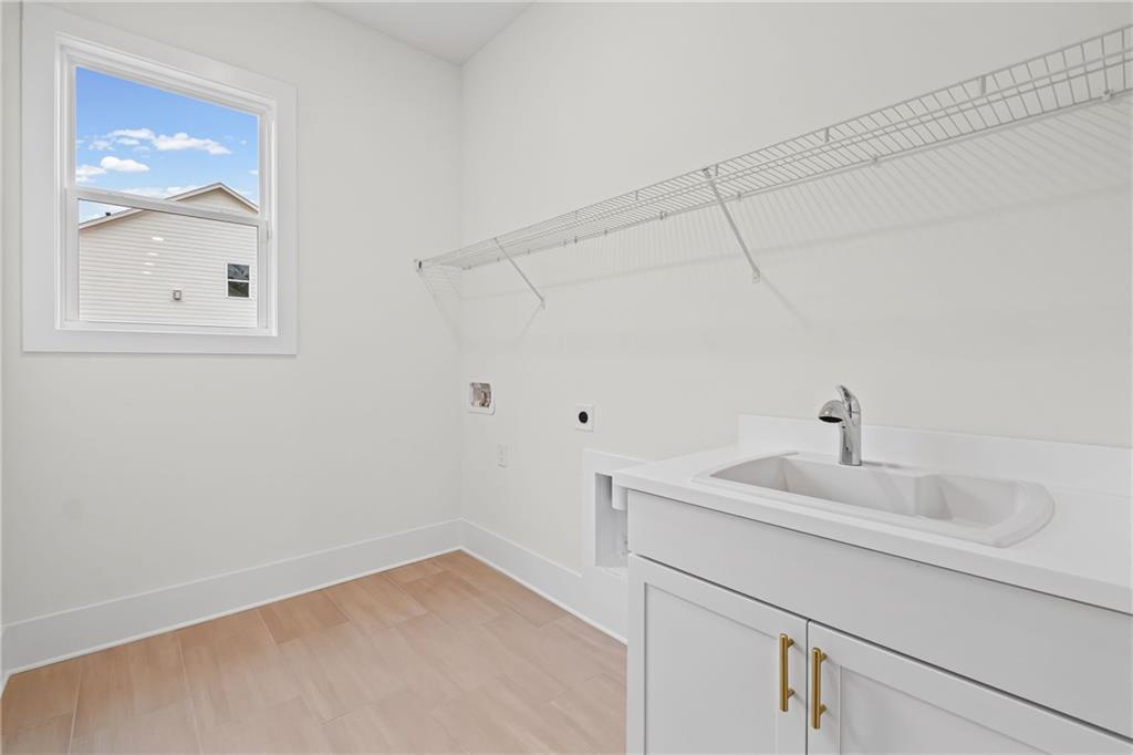 178 Mooney Road Woodstock, GA 30188 - Photo 14 of 42 a bathroom with a sink and vanity