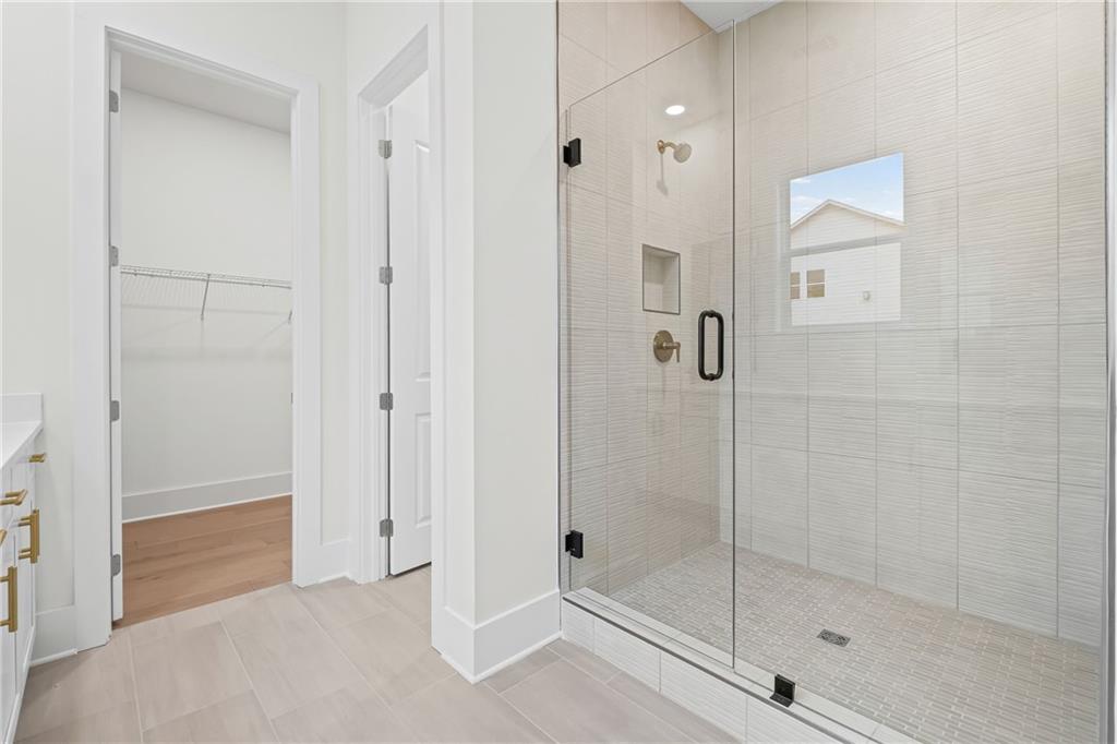 178 Mooney Road Woodstock, GA 30188 - Photo 20 of 42 a bathroom with a shower
