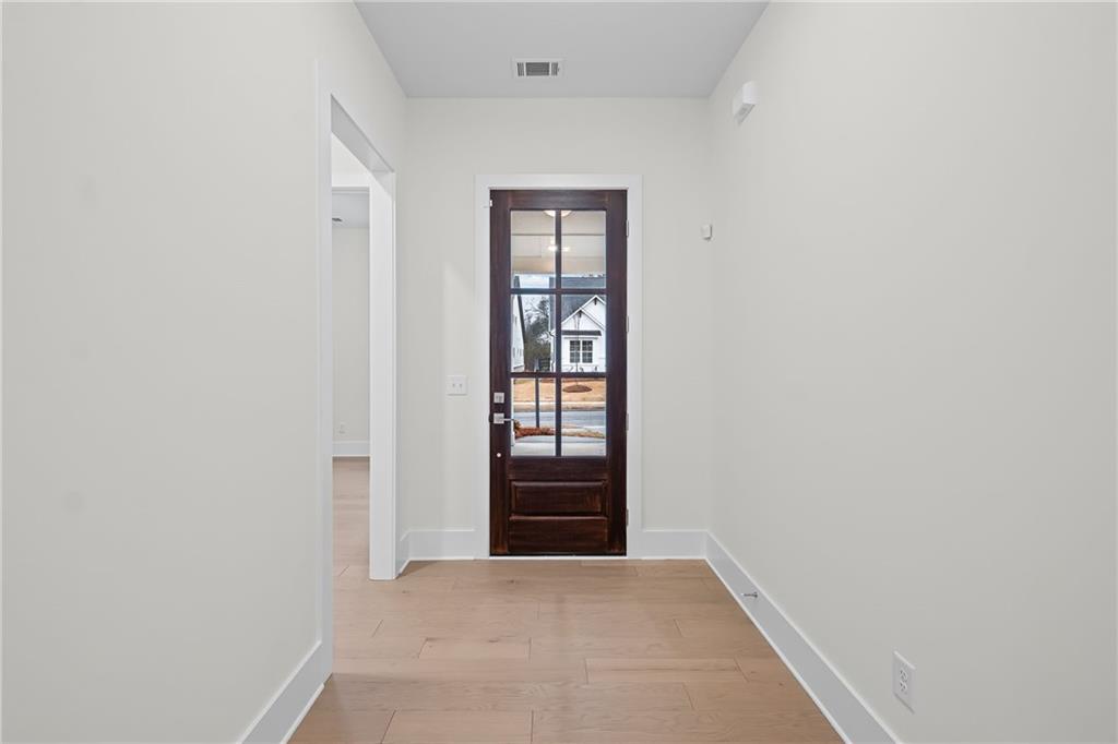 178 Mooney Road Woodstock, GA 30188 - Photo 4 of 42 a view of an entryway door