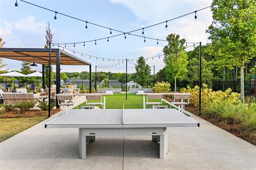 178 Mooney Road Woodstock, GA 30188 - Photo 42 of 42 a view of a patio with a table and chairs