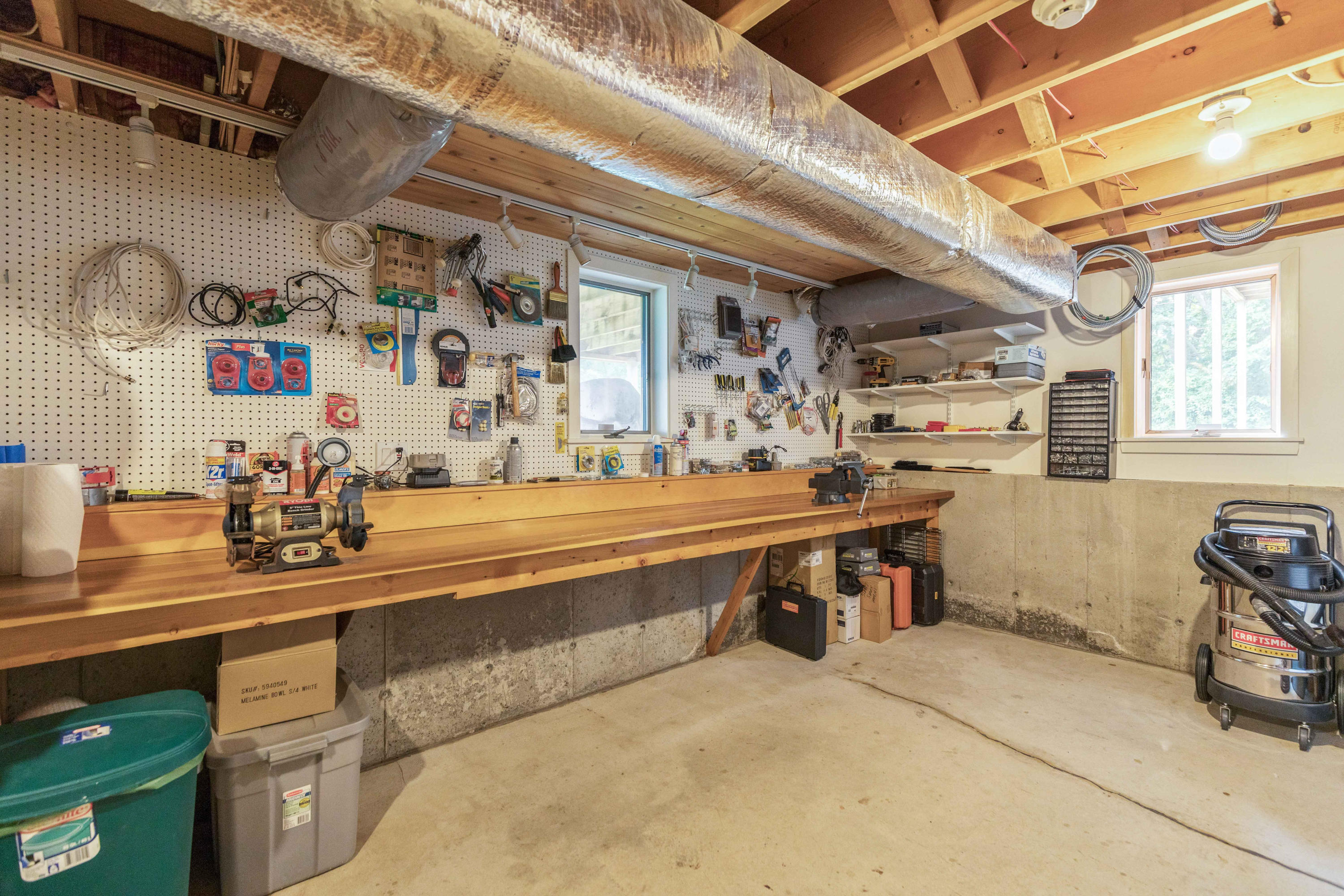 71 Schooner Ridge Road Cumberland Foreside, ME 04110 - Photo 48 of 57 Workbench in the basement.